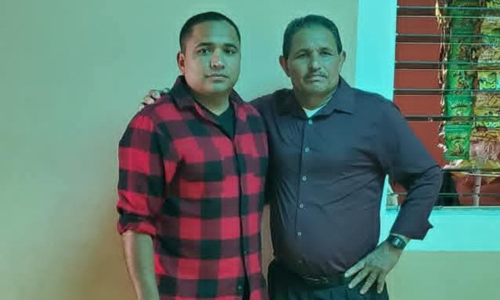 Hugo Ochoa with his father